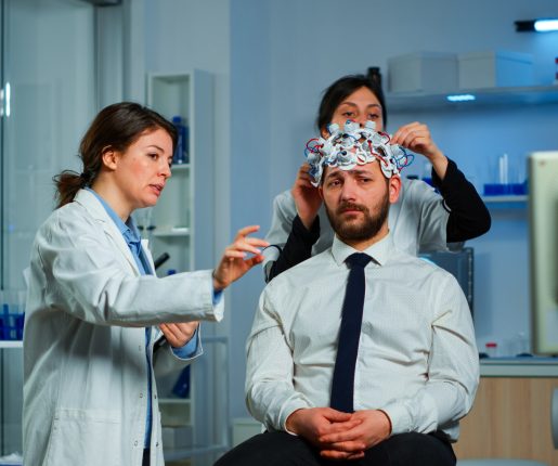 Neurological researchers explaning treatment result pointing on monitor while medical scientist adjusting brainwave scanning headset preparing for brain scan analysing electrical activity SSUCv3H4sIAAAAAAAACpRVyY7cNhC9B/A/DHg2Ee5LviAXn3IMfKBIalqwJDa0ODYG8+8u7ZTcM4NcGq2qx2LxveLjy6c/np5Q4frKo7+eXqYv+K7qeuyHzg1VaiFMPq/xLrYhdnnke8cVyQMxVEPqKlfnwcIN/ta6JkKwHet6Cr/OSdQPbhj72Ge7329pSGFsJzTfSjSV71I/JP/tDr1Bhu4ZCM9LTtEQ76mvjgTTW+ae2iBPEVe75uc5ElIR591O4dBF1/RDNR/kCPtUp7Er0o+8gXv1Y3AnWPwZY5NDKONdea7k2uWMU9unTH8bhyF2v/fUpEmlWMcmtsN0Up6x690Qn0GOE7+b2v8u309bYu1ggBT6O7p6uHnXxT+/gKQe9Fw3XLoZiwn1pep9rGvXxgSabPll7zcK/+Or2Pr4P6otf77u0jzD+kmtl9fsoB0Q4JYxWo+FClY4FrnHglOJhQkeFwURuOQyUEpdCEW5tYEYMU5RpzClTGEhlMaGaIFJwQP1RlJn1Q6WpSgUFQF7WUJlWRjsDPxEFwhX3lovxQ5WQUhNrcHMO44FYQQbqwN2XFMWCuZoONoItFReQLtSUoZFYAV2IlpMghYlpUWpApmZWehA3/6DmWhmcVci3BiqlIn9PYF217G4d5Wv2udsWRpu88Xelvk0tkM30Yz25uqU7q6op9kvoWbc4jfX9wAPWzyfP7CR1GT7tGmYRVqrogADOn1SzhRVwhiqhSZcUoJyf7hVUGduZ2twvNfJhThtuk/ZA5OAokpyIdg+bxe/mAGwpTwAV+tYMNISe2A2E3mU2+zkYS43lkeAk8UsAEX45qRXs3mQ33znUW53oCVH5WZFmRmtOaaz3NWWVoykGeZiUCvE2s3BH1nVAtKMywWzOcfkCE0F5c7y5g8DLBUchkbxj4SDgVJvCacVfZM6baX54HhGGfKetkpI8662MJtUfETQBXQSShnLzOPR09pQwt8VUVPNwZBW8k+vMgCrkL8aV3KRkBbOz+x6UzNuEZXEWsH04YIbtUhzowQTx6ILsYjCQqssTOcOORGLBGOWwo85XDPnFTFIaiXZsflvtCKwGstF5tIbqVDLPafew0mgKAMCCWXy6HYjGLEymsI6g2mk8MQQeAgs+BGOtgSTLu2+4ko7guvOhNVs9vGV72oadATWL7kxDsuSCnD/SLCDO4pLy+BVskX0toRVr78AAAD//wMATQqavbUJAAA=